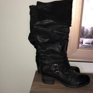 Tall heeled boots